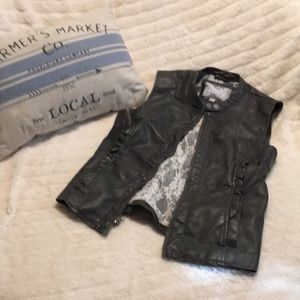 Women’s grey ruffled lace vest